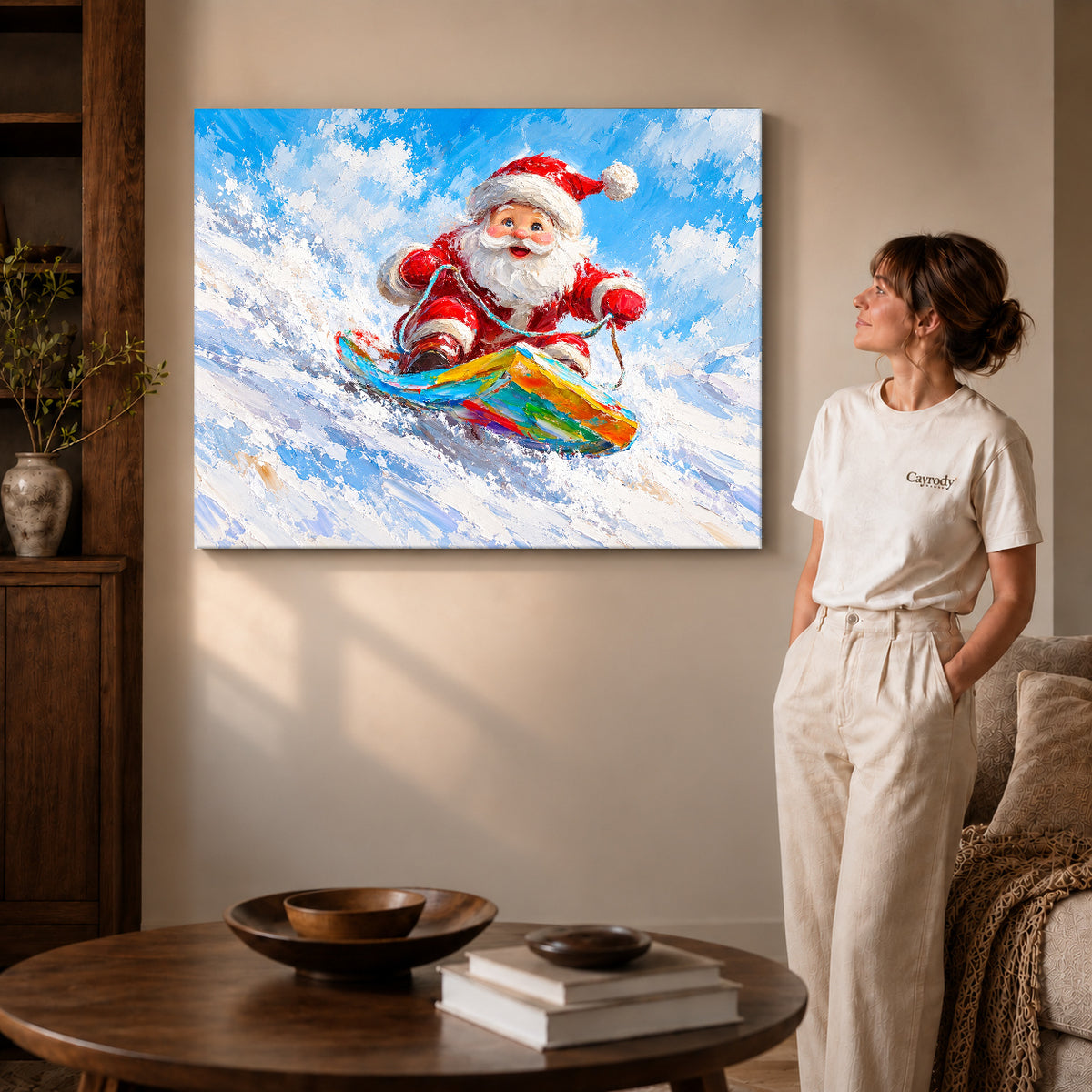 Snowboard Santa canvas art on gallery-wrapped canvas with visible edge depth beside a standing woman.