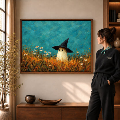 Meadow ghost canvas art in a walnut frame beside a standing woman and wooden console.