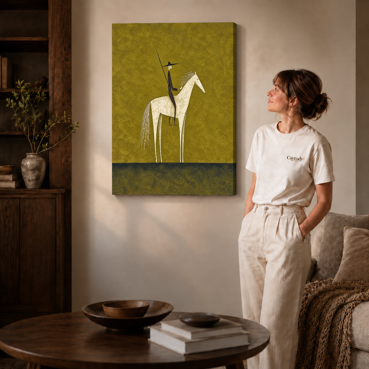 Folk horse canvas art on gallery-wrapped canvas with natural edge shading beside a standing woman.