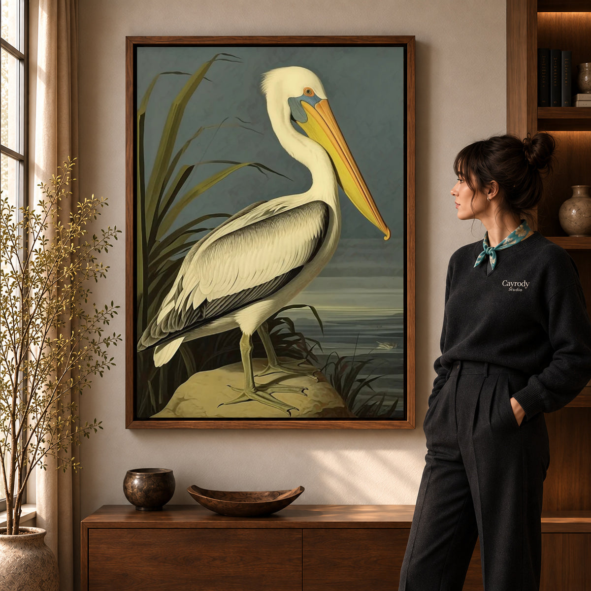 Vintage pelican canvas art shown in the walnut frame option within a warm living room.