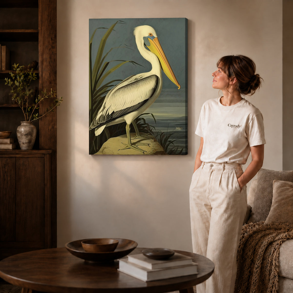 Vintage pelican canvas art shown in the gallery-wrapped option with visible depth and warm surroundings.
