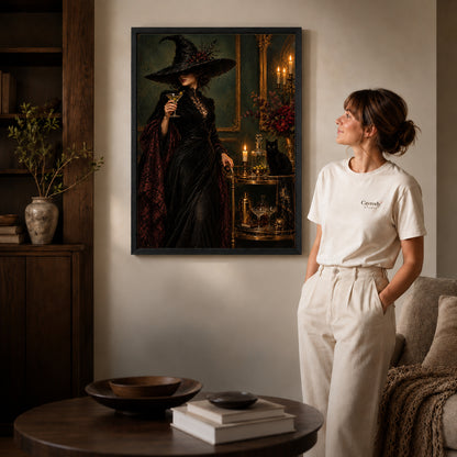 Gothic witch canvas art shown in the black frame option beside a woman dressed in white.