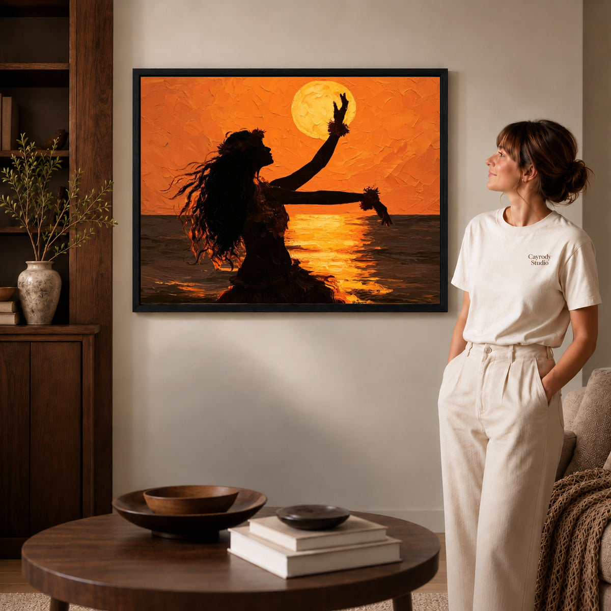 Sunset dancer canvas art shown in the black frame option against a softly lit wall.