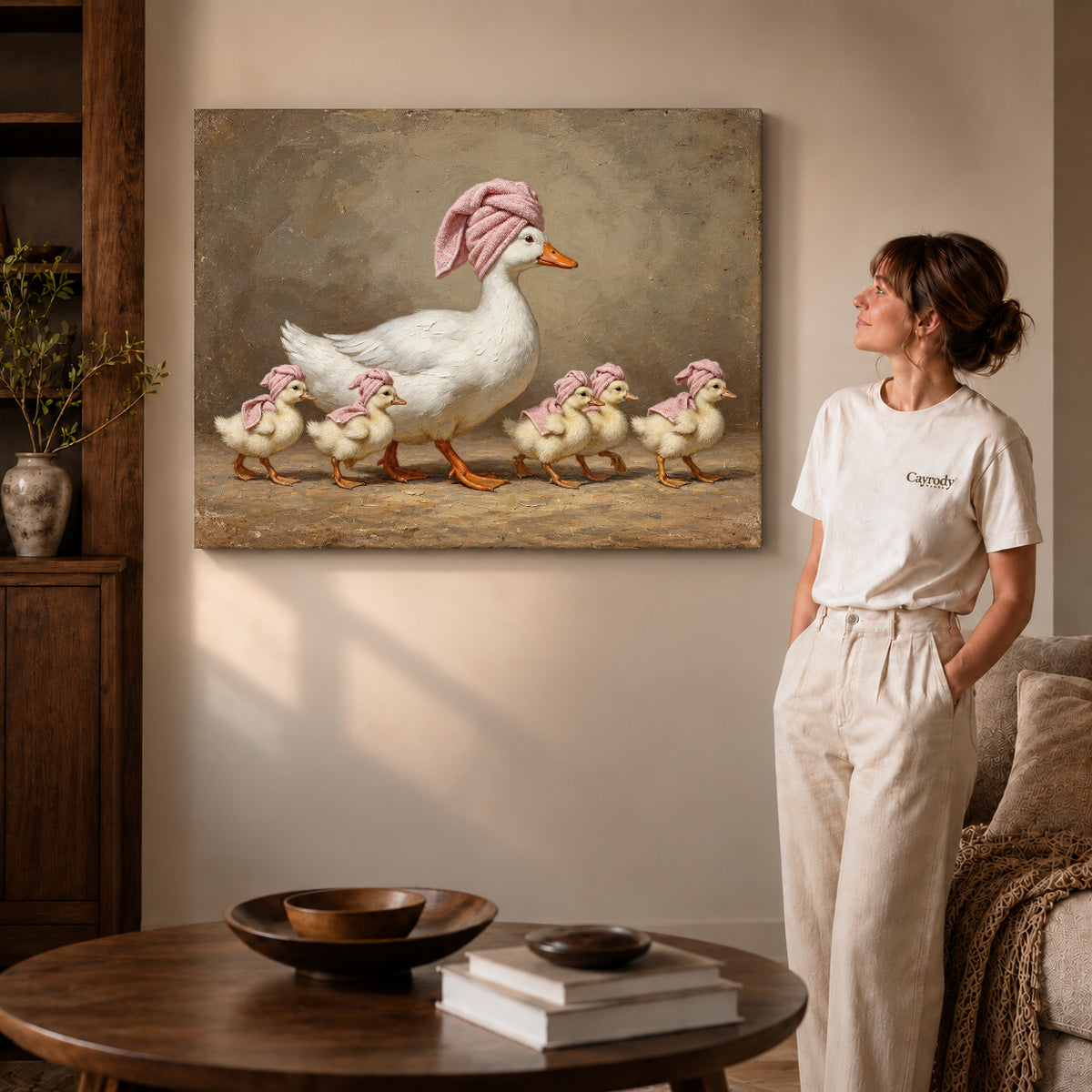 vintage spa duck family canvas art on gallery-wrapped canvas with visible edge depth beside a standing woman.
