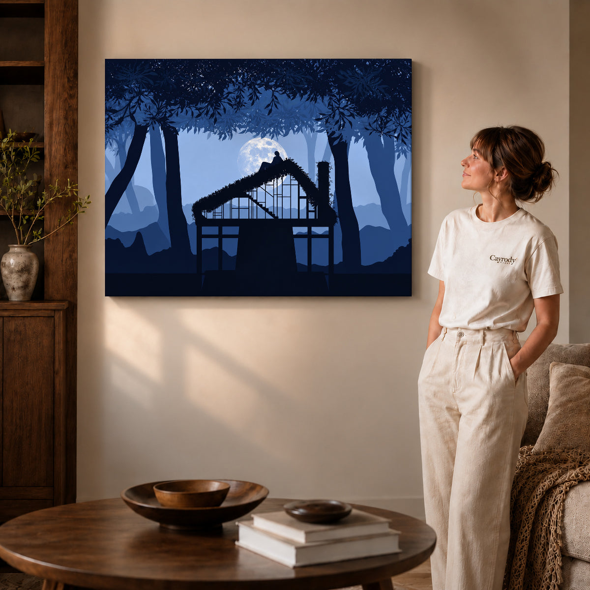 Moonlit cottage canvas art shown in the gallery-wrapped option with natural side shading and warm surroundings.
