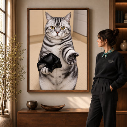 Empty Wallet Cat canvas art in a walnut frame beside a standing woman and wooden console.