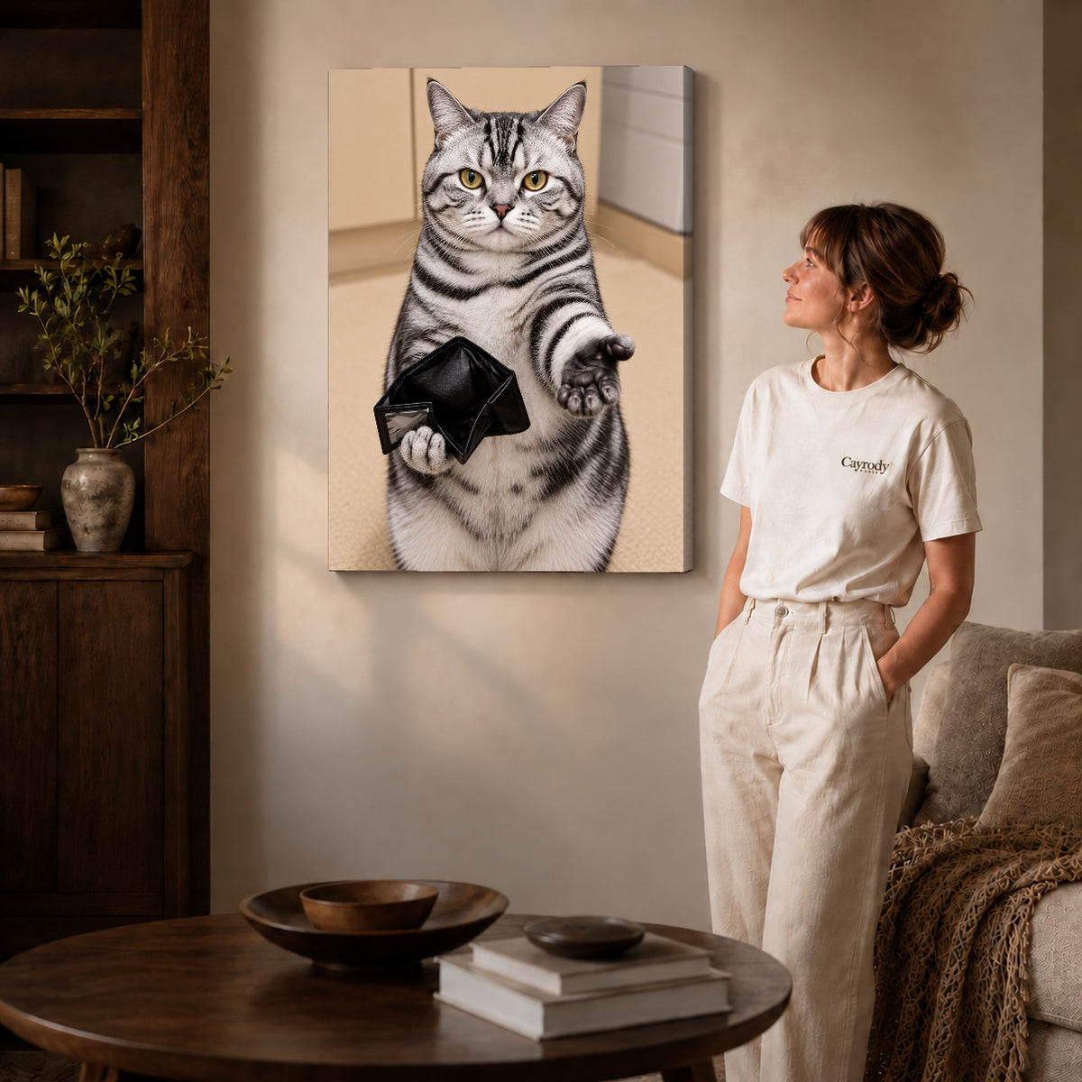 Empty Wallet Cat canvas art on gallery-wrapped canvas with natural edge shading beside a standing woman.