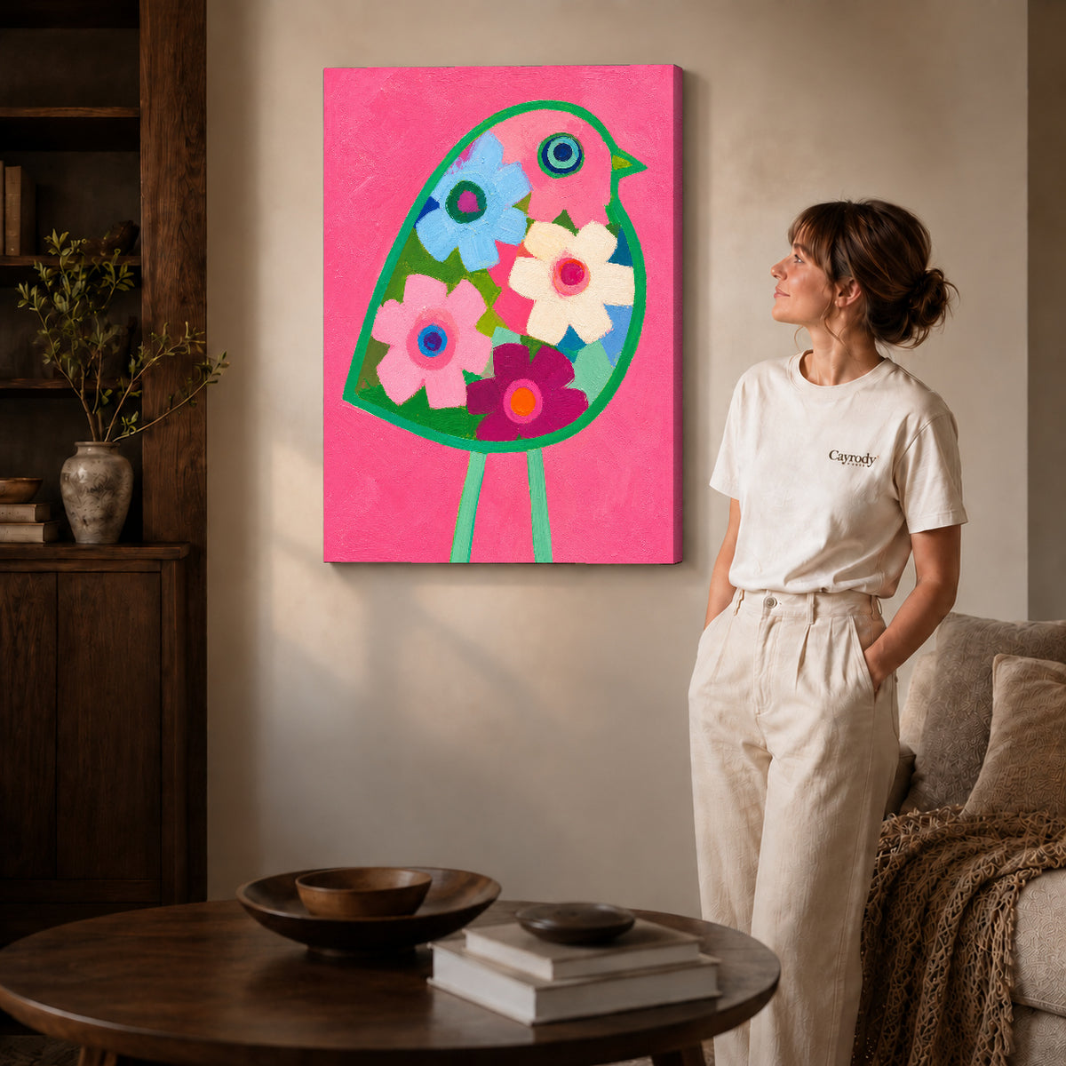 Floral bird canvas art shown in the gallery-wrapped option with visible depth and warm surroundings.