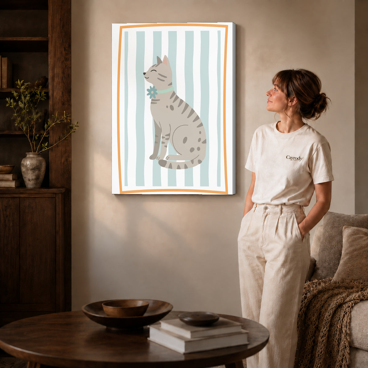 Tabby cat canvas art shown in the gallery-wrapped option with visible depth and warm surroundings.