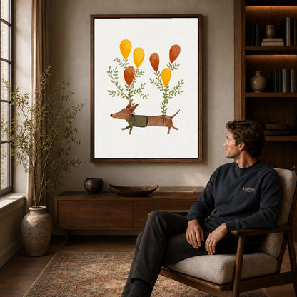 Balloon dachshund canvas art in a walnut frame above a console beside a seated man.