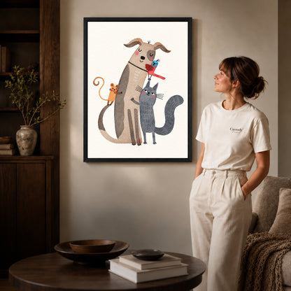Animal friends canvas art in a black frame beside a woman and round wooden table.