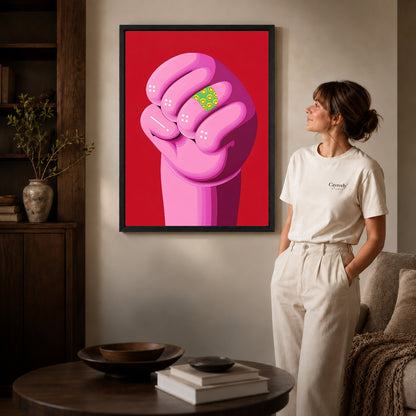 Pink Smiley Fist canvas art shown in the black frame option against a softly lit wall.