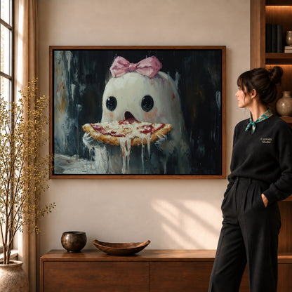 Pizza ghost canvas art in a walnut frame beside a standing woman and wooden console.