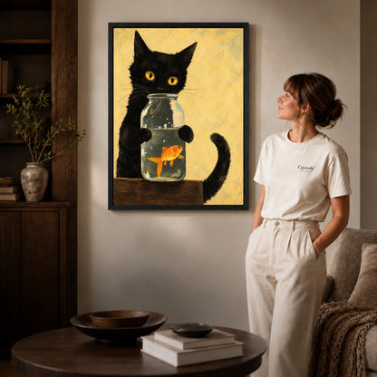 Black cat goldfish canvas art shown in the black frame option with warm furnishings and a standing woman.