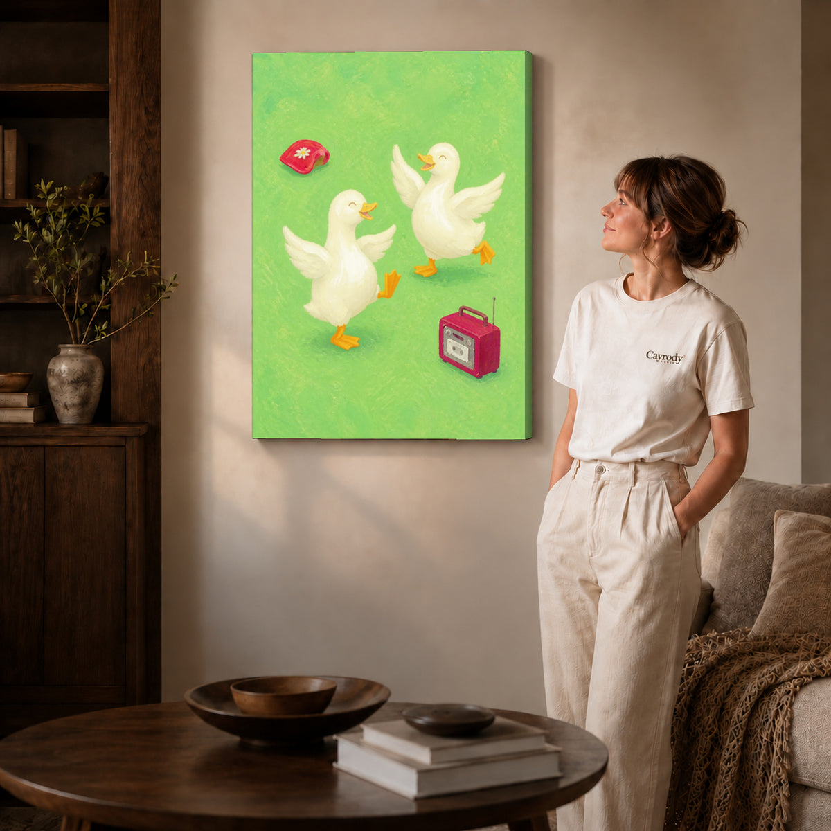 Dancing ducks canvas art shown in the gallery-wrapped option with visible depth and warm surroundings.