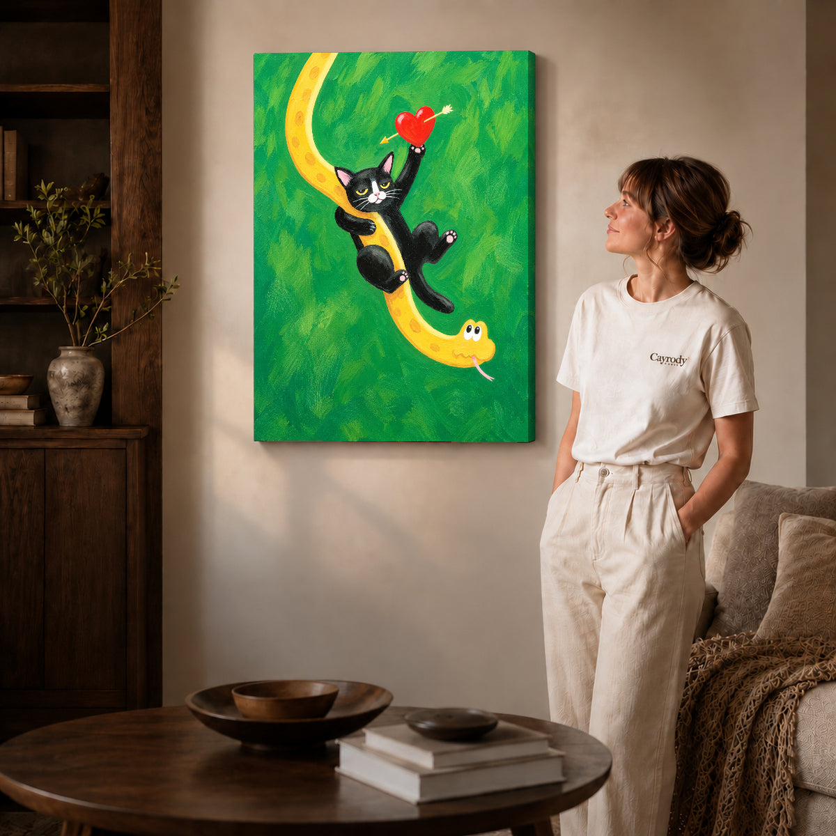 Cat and snake canvas art shown in the gallery-wrapped option with visible depth and warm surroundings.