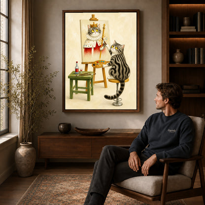 Cat artist canvas art in a walnut frame above a console beside a seated man.