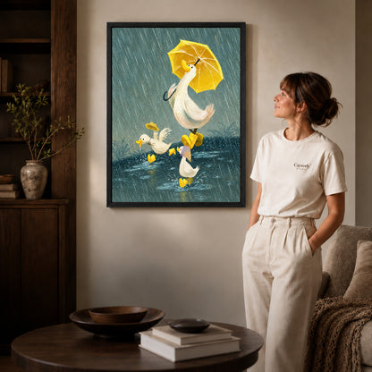 Rainy ducks canvas art in a black frame beside a woman and round wooden table.