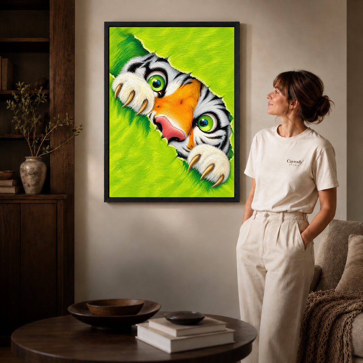 Peeking tiger canvas art shown in the black frame option against a softly lit wall.