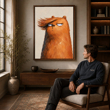 Grumpy bear canvas art in a walnut frame above a console beside a seated man.
