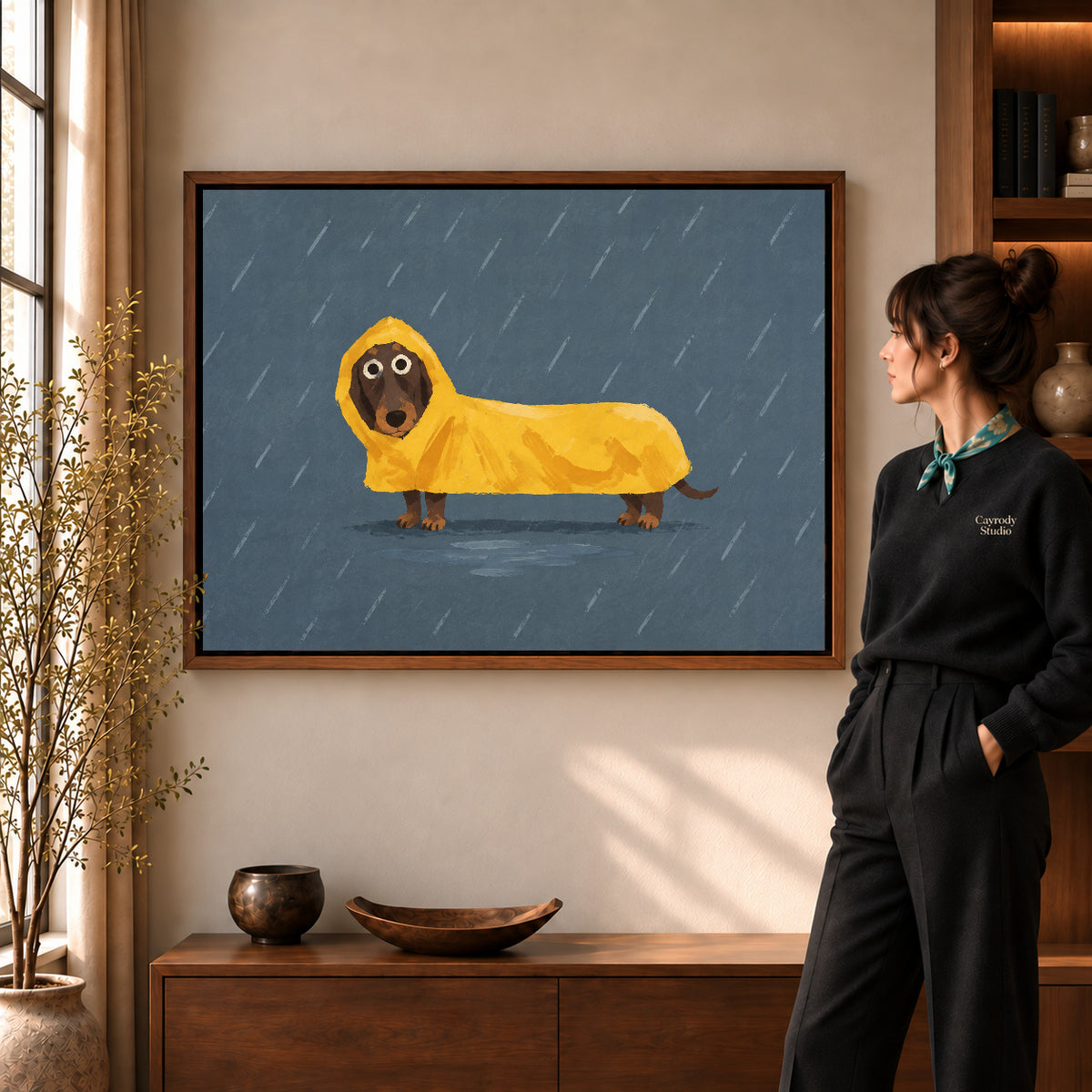Dachshund raincoat canvas art shown in the walnut frame option within a warm living room.