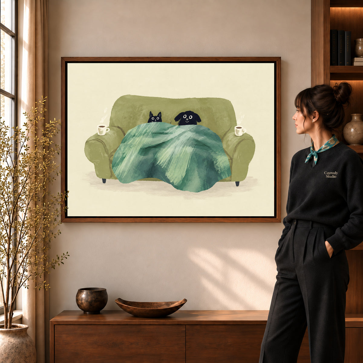 Cozy pets canvas art shown in the walnut frame option within a warm living room.