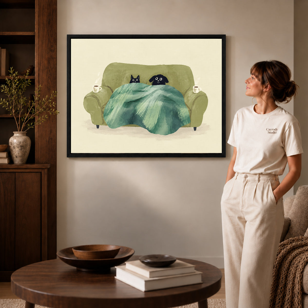 Cozy pets canvas art shown in the black frame option against a softly lit wall.