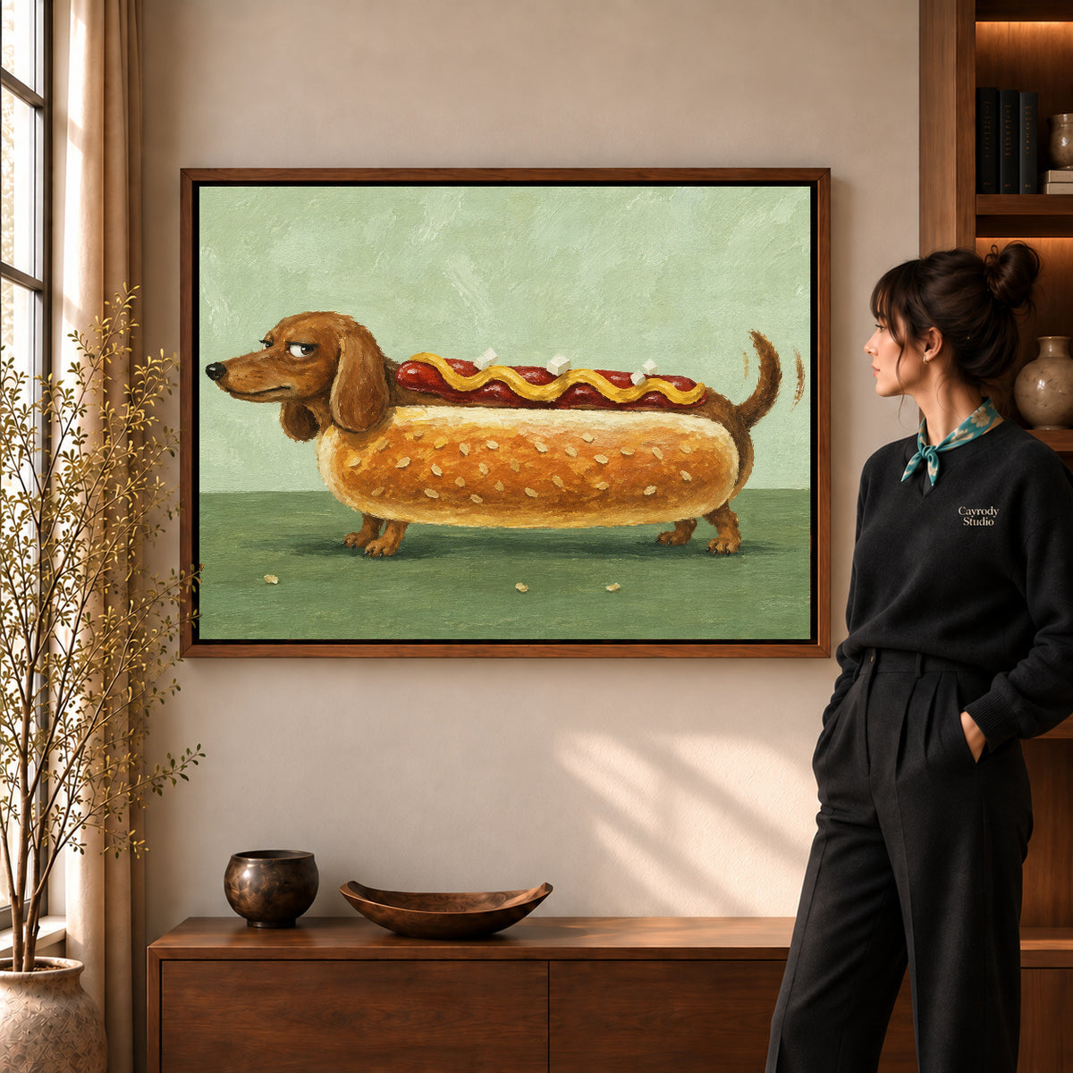 Dachshund hot dog canvas art shown in the walnut frame option within a warm living room.