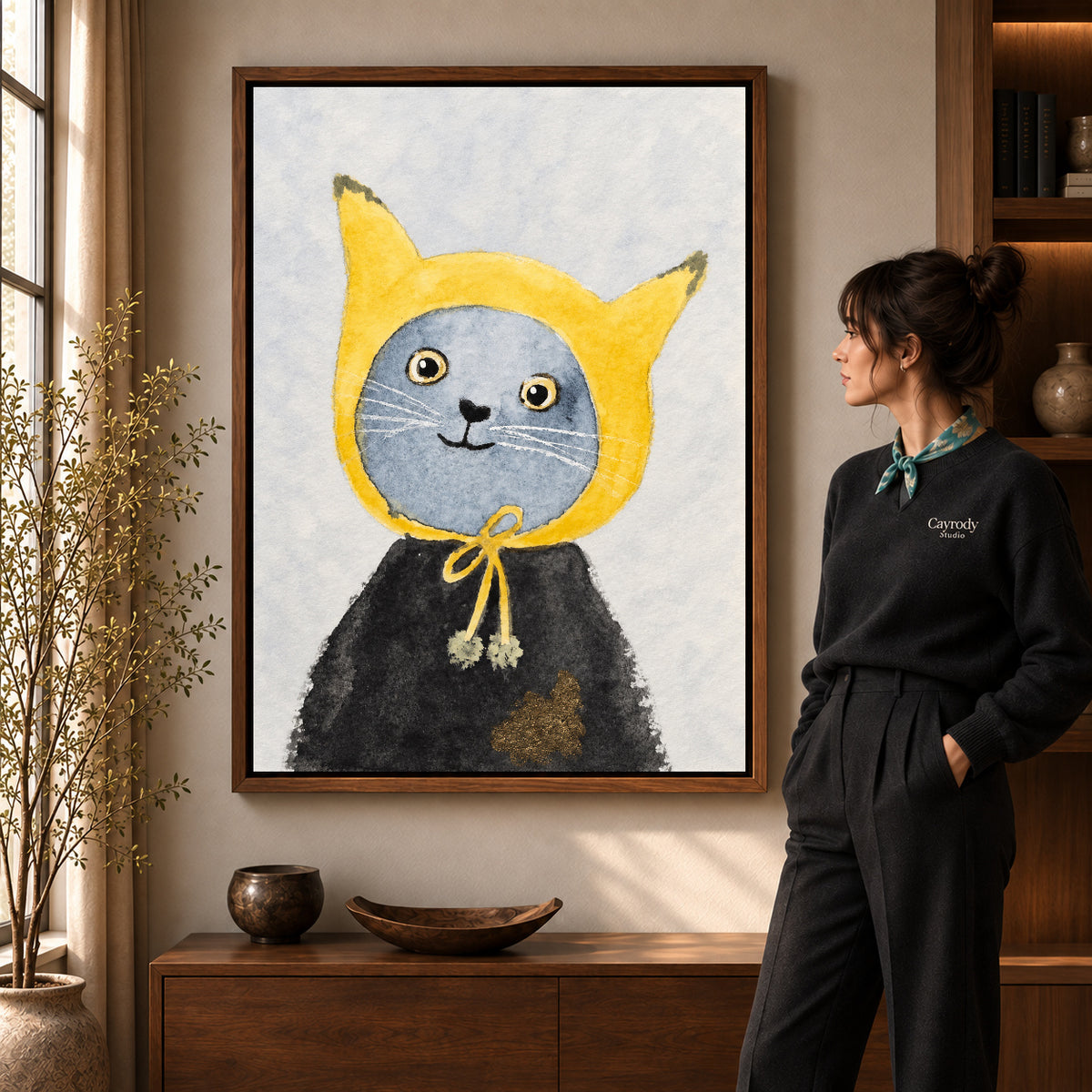 yellow hood cat canvas art shown in the walnut frame option within a warm living room.