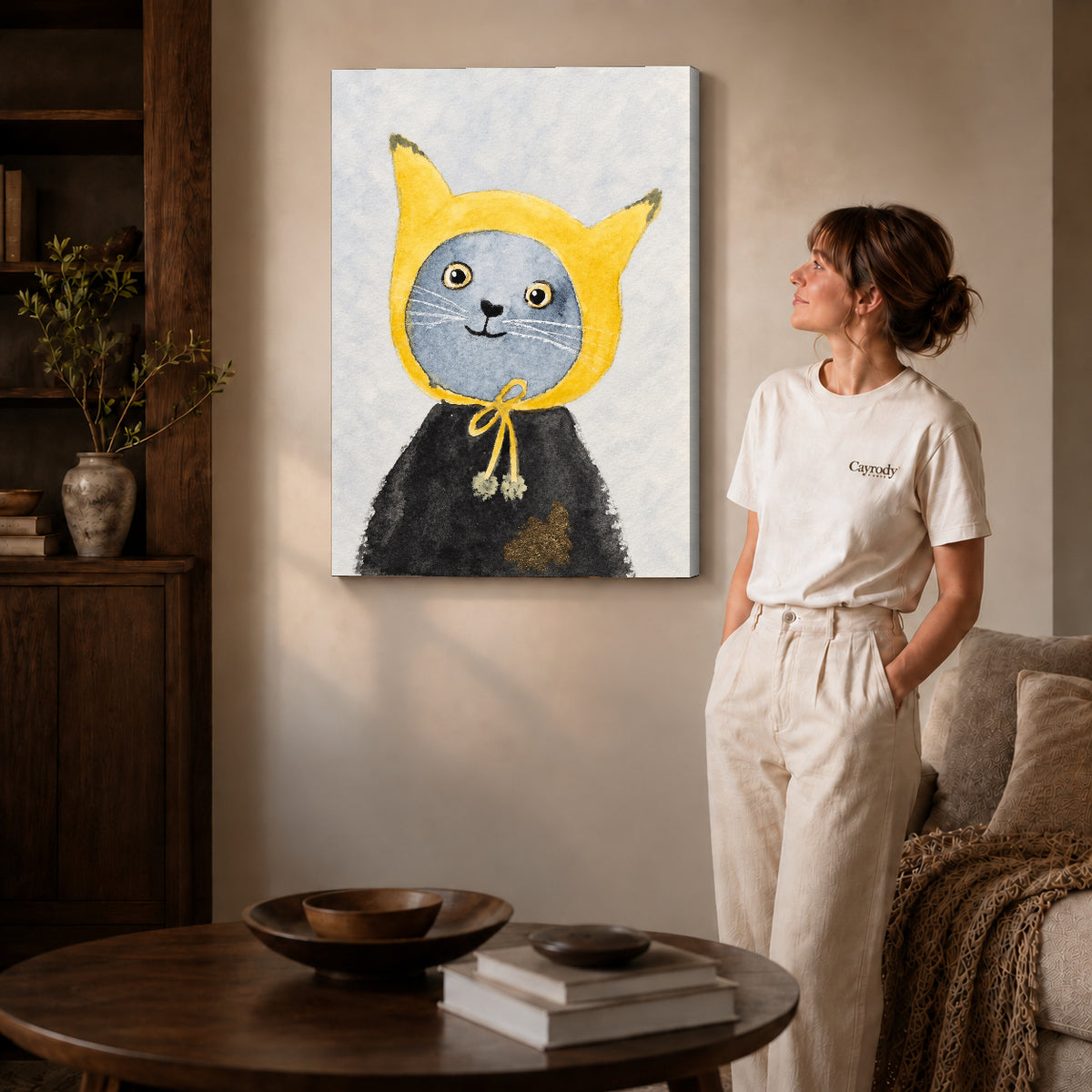 yellow hood cat canvas art shown in the gallery-wrapped option with visible depth and warm surroundings.
