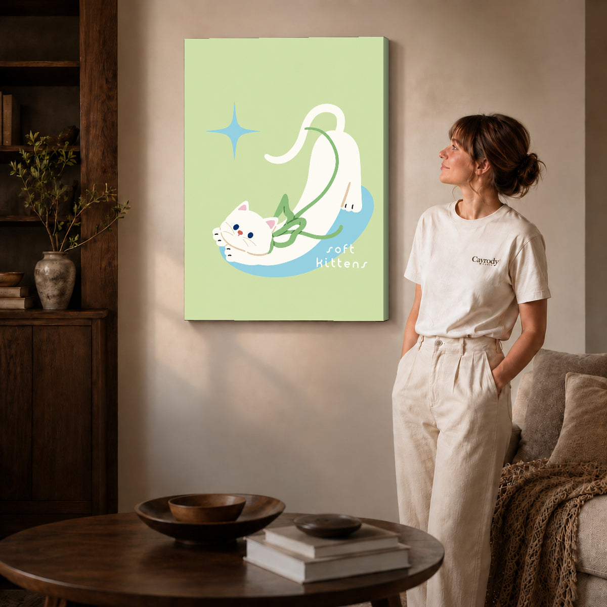 stretching white kitten canvas art shown in the gallery-wrapped option with visible depth and warm surroundings.