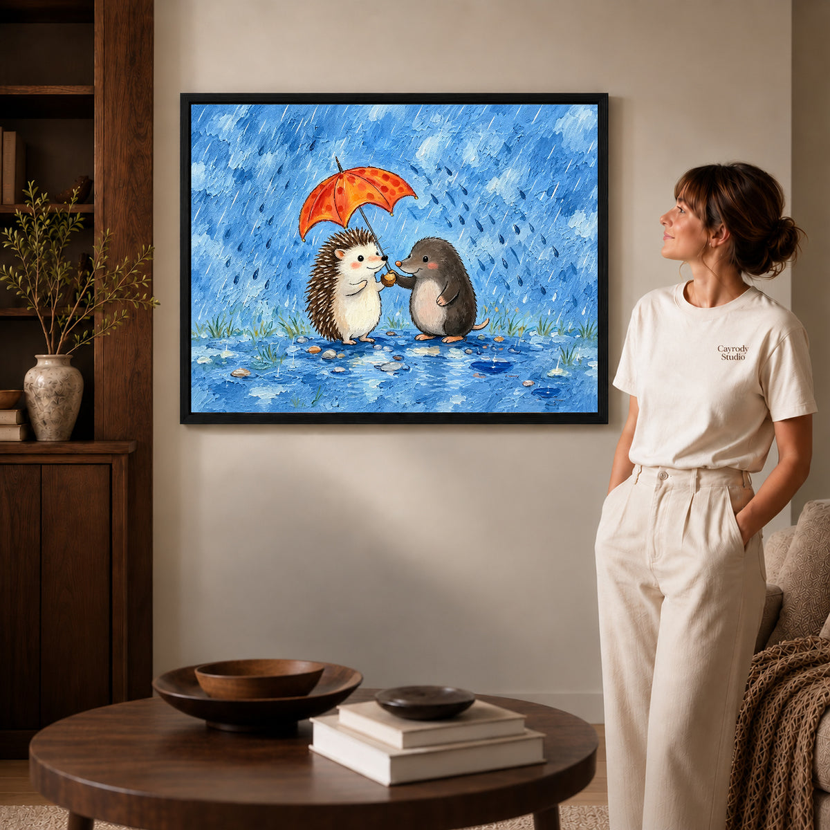 rainy hedgehog friends canvas art shown in the black frame option against a softly lit wall.