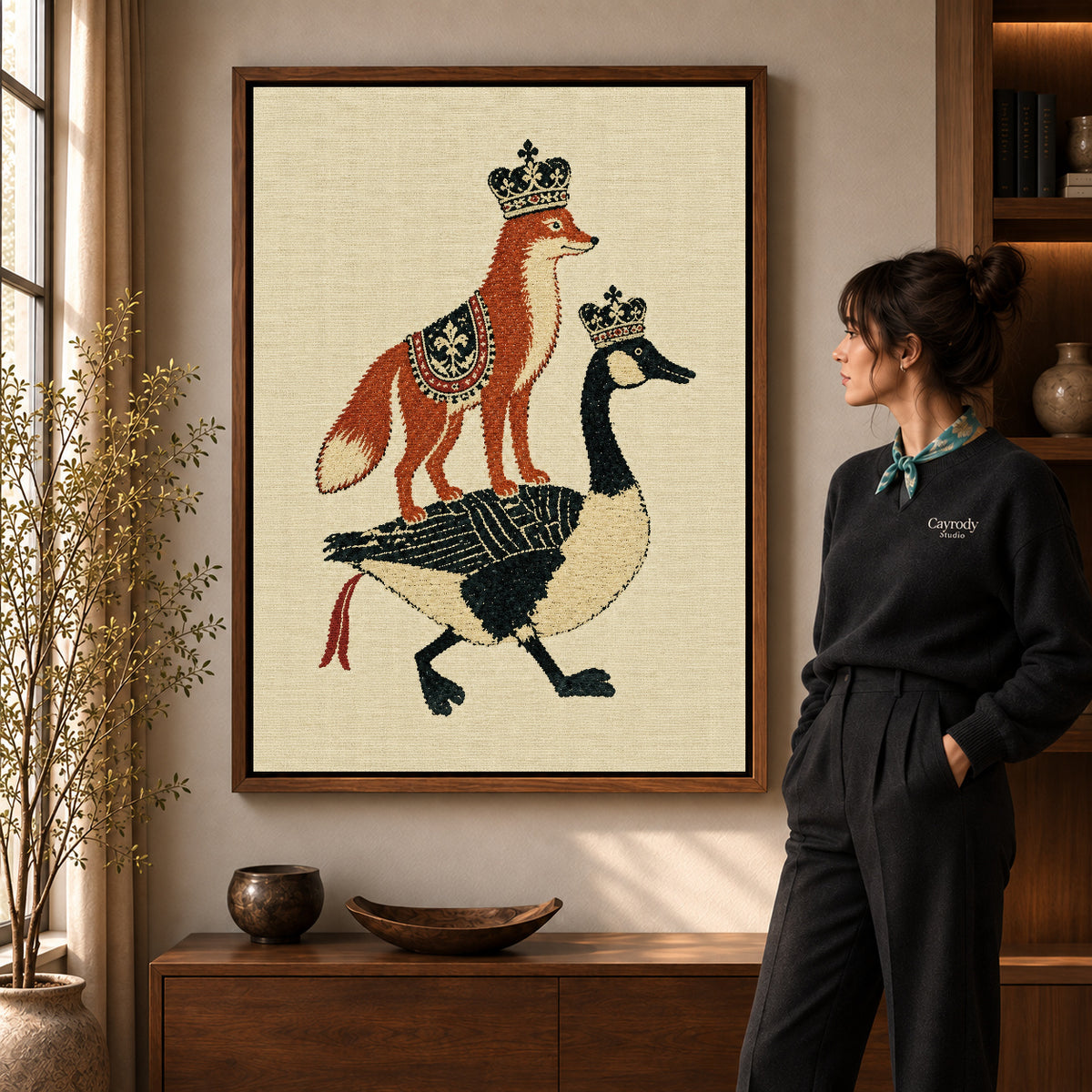 royal fox goose canvas art in a walnut frame beside a standing woman and wooden console.