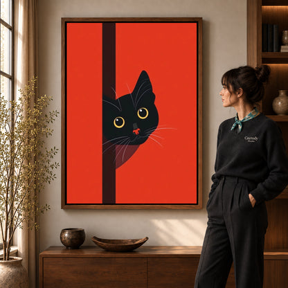 peeking black cat canvas art shown in the walnut frame option within a warm living room.
