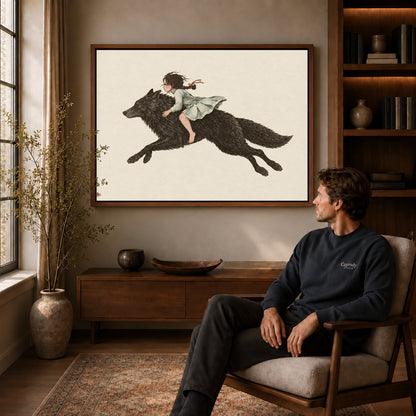 fairytale wolf rider canvas art in a walnut frame above a console beside a seated man.