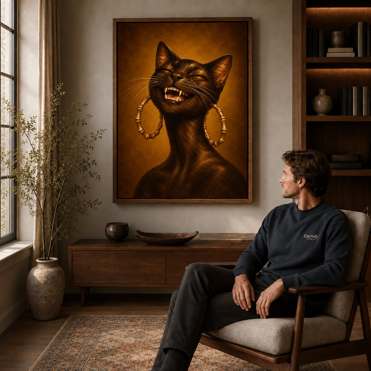 expressive golden cat canvas art in a walnut frame above a console beside a seated man.