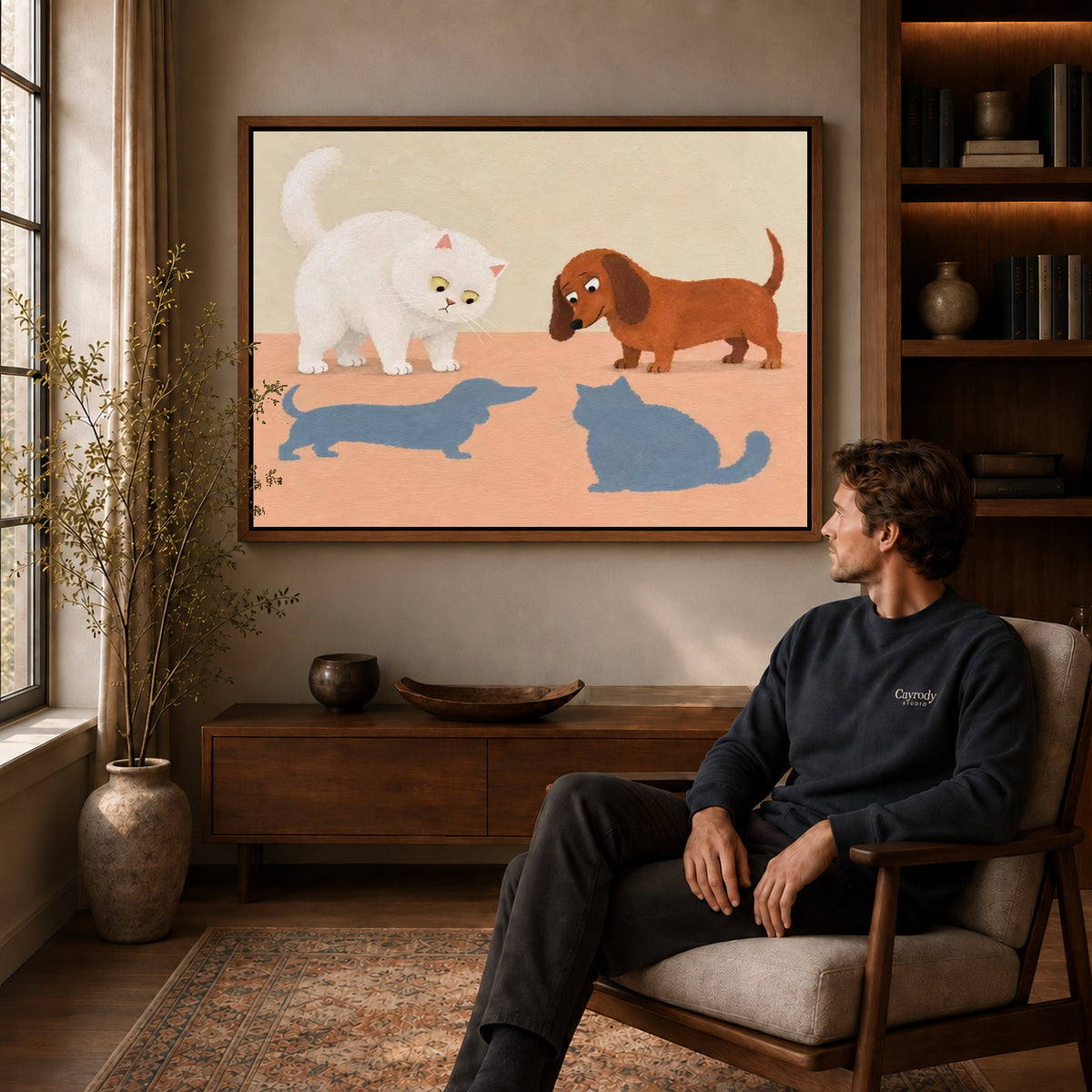 playful swapped shadows canvas art in a walnut frame above a console beside a seated man.