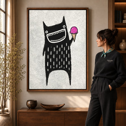folk ice cream monster canvas art shown in the walnut frame option within a warm living room.