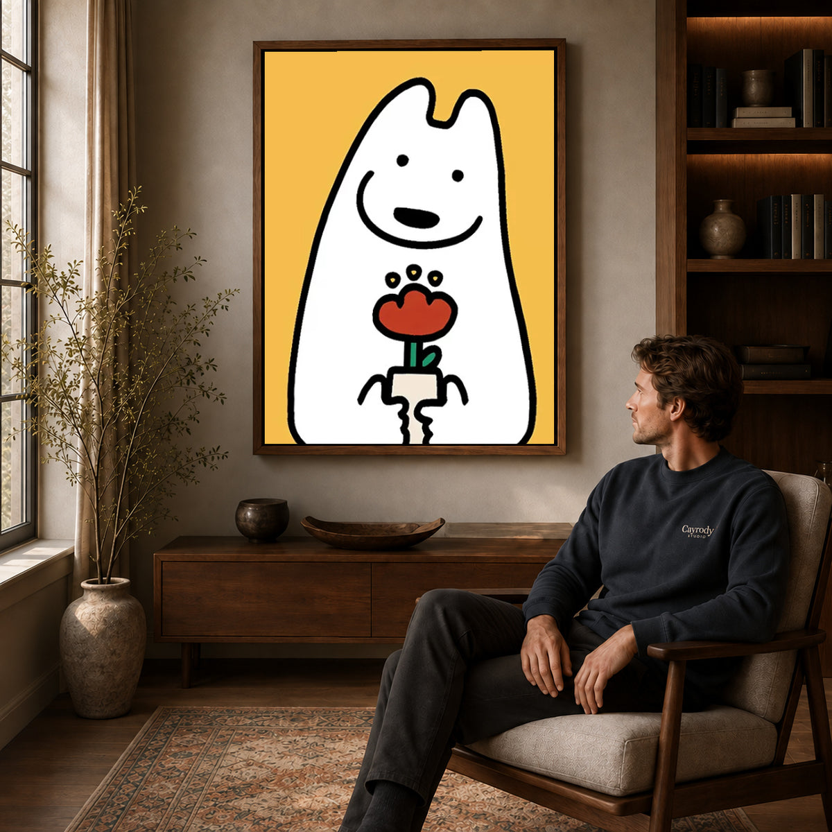 cheerful flower friend canvas art in a walnut frame above a console beside a seated man.