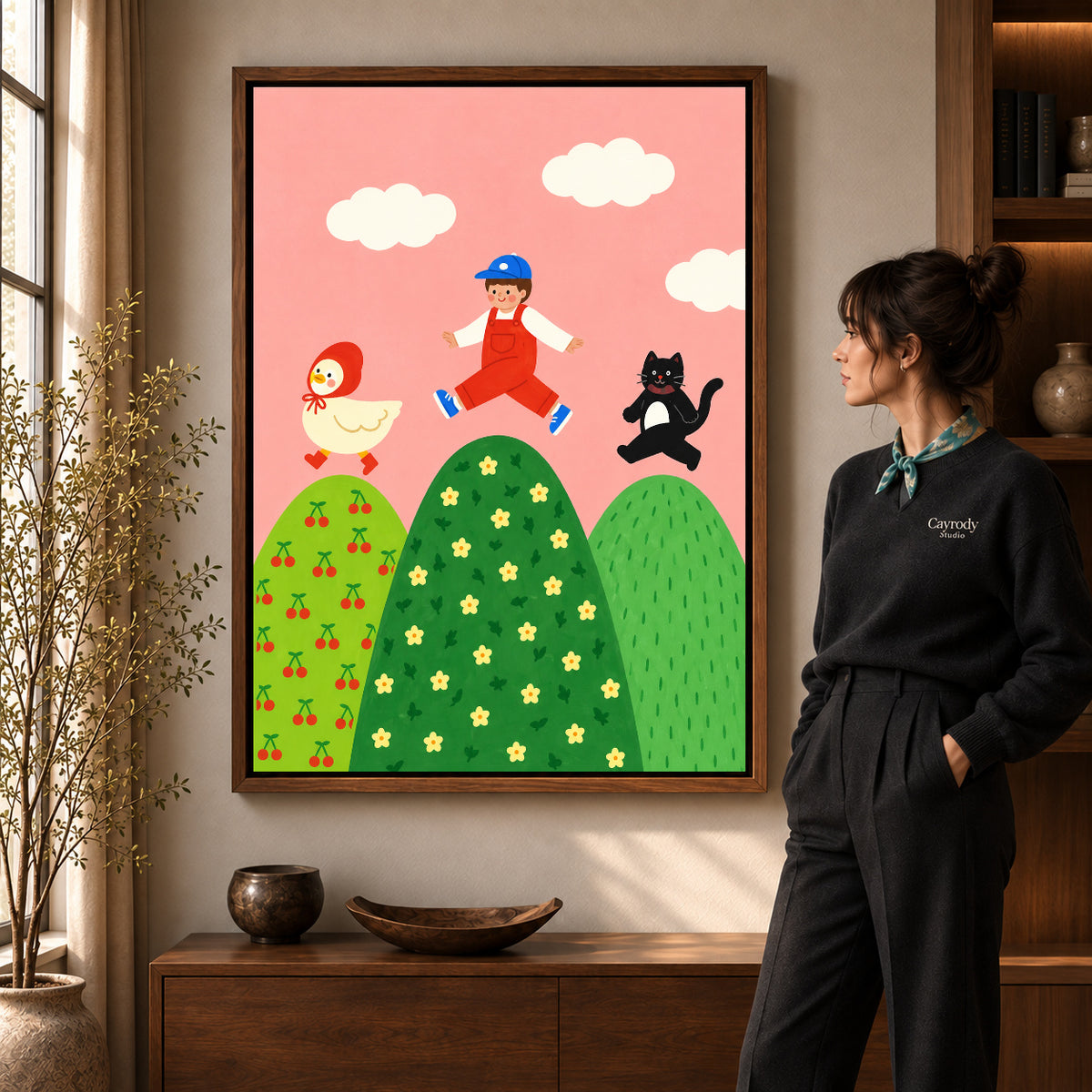 playful hilltop friends canvas art shown in the walnut frame option within a warm living room.