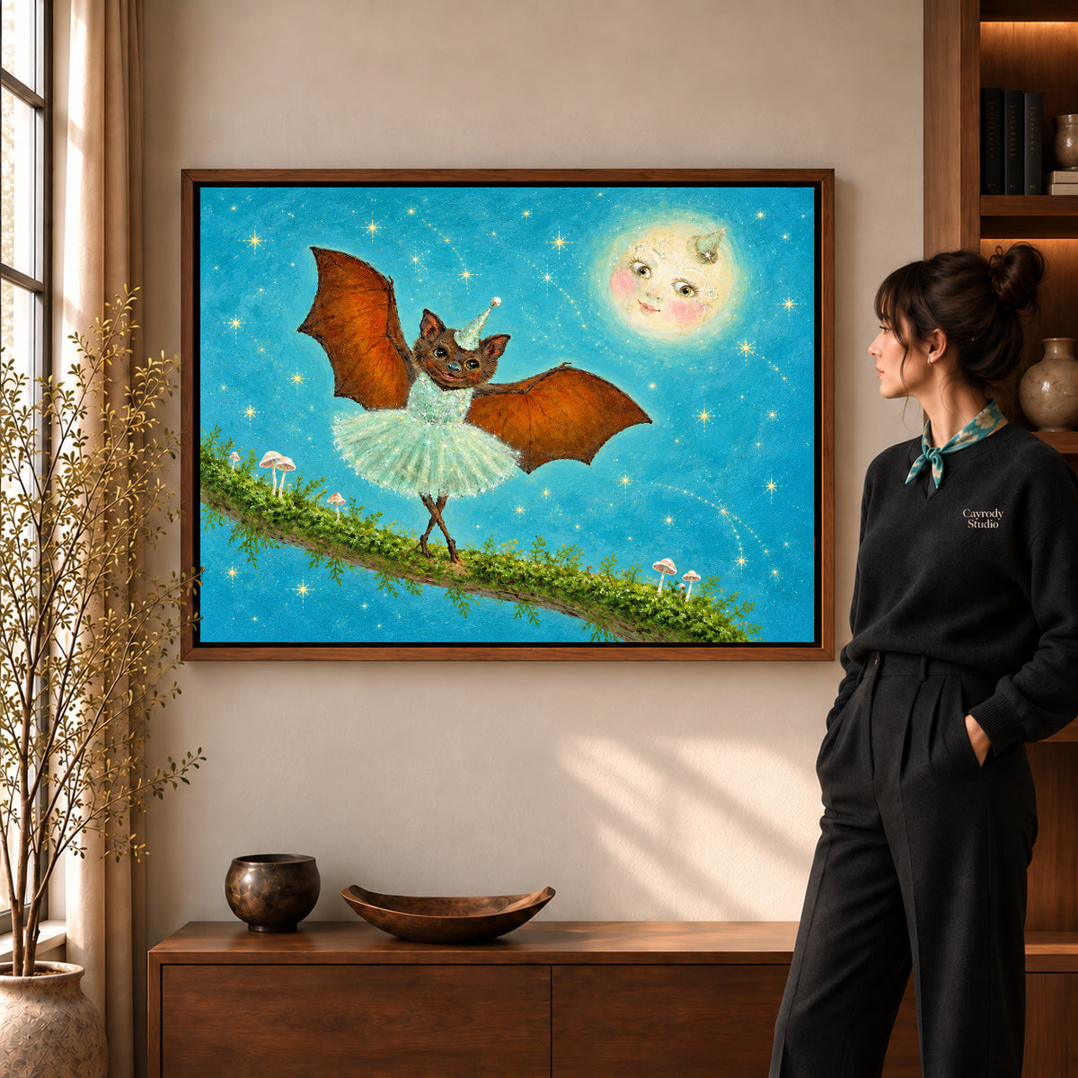 fantasy ballet bat canvas art shown in the walnut frame option within a warm living room.