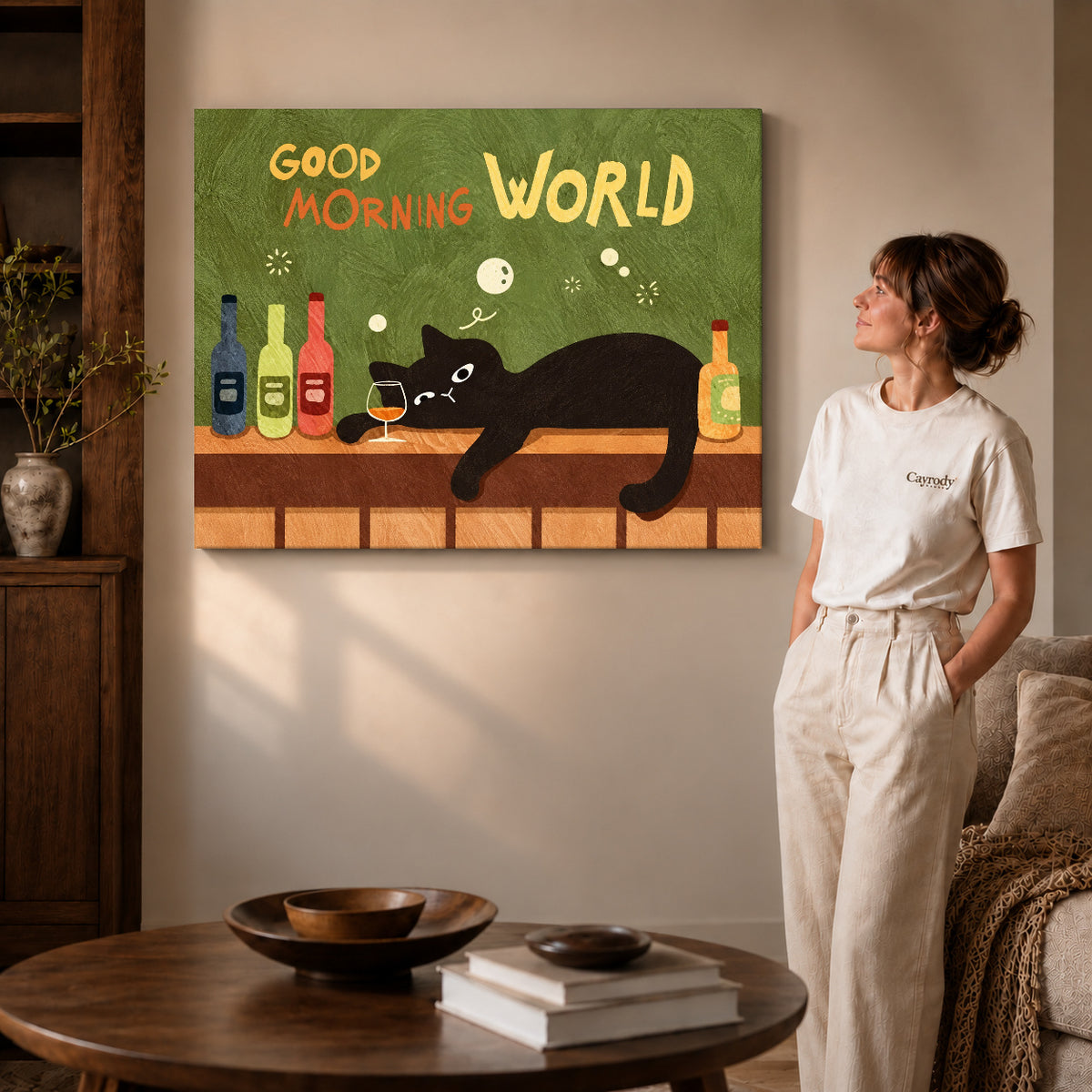 playful morning bar cat canvas art on gallery-wrapped canvas with visible edge depth beside a standing woman.