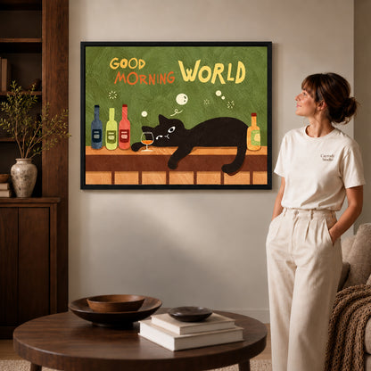 playful morning bar cat canvas art in a black frame beside a woman and round wooden table.