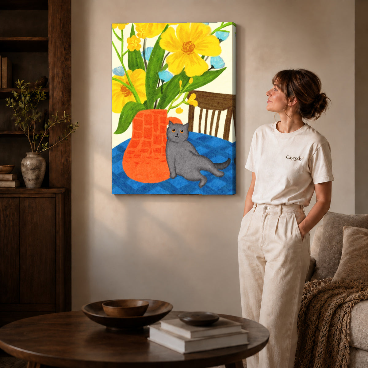 expressive floral cat canvas art on gallery-wrapped canvas with natural edge shading beside a standing woman.