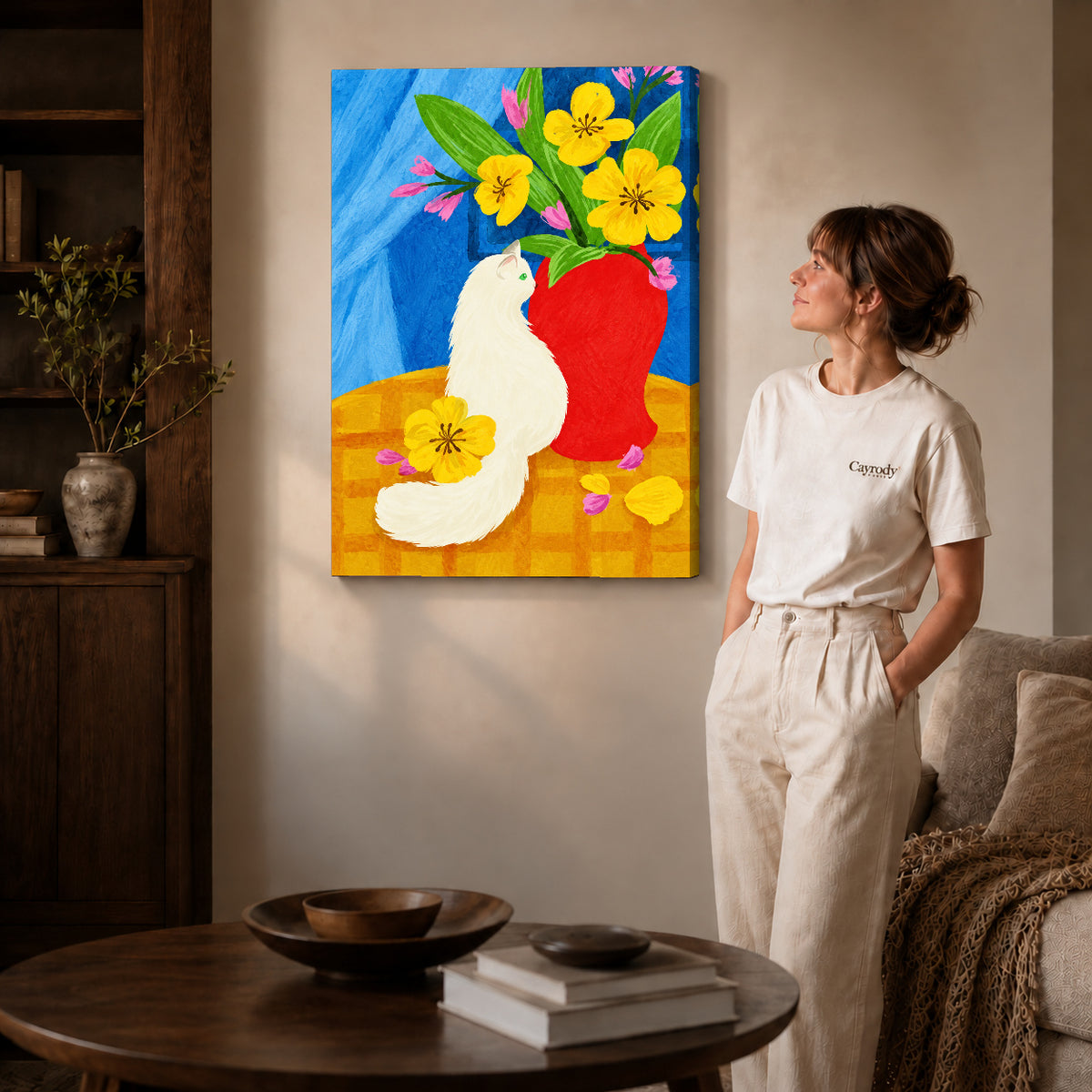 painterly white cat canvas art on gallery-wrapped canvas with natural edge shading beside a standing woman.