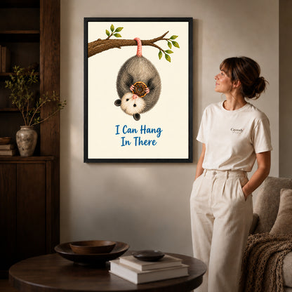 whimsical donut opossum canvas art shown in the black frame option against a softly lit wall.