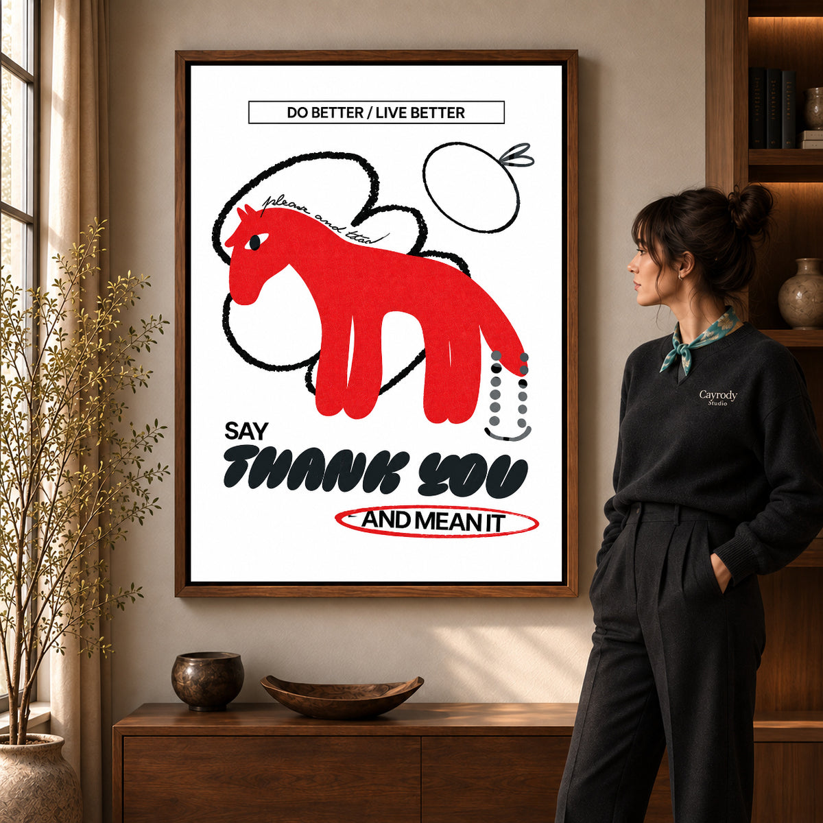 graphic gratitude horse canvas art shown in the walnut frame option within a warm living room.