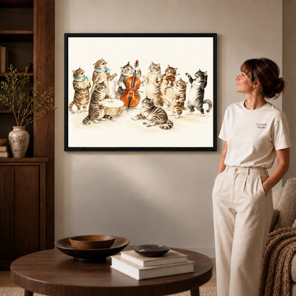 vintage cat orchestra canvas art shown in the black frame option against a softly lit wall.