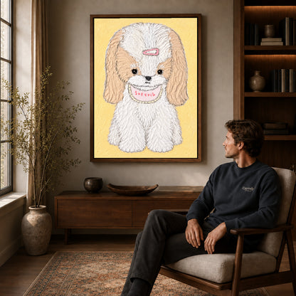 sweet long eared puppy canvas art in a walnut frame above a console beside a seated man.