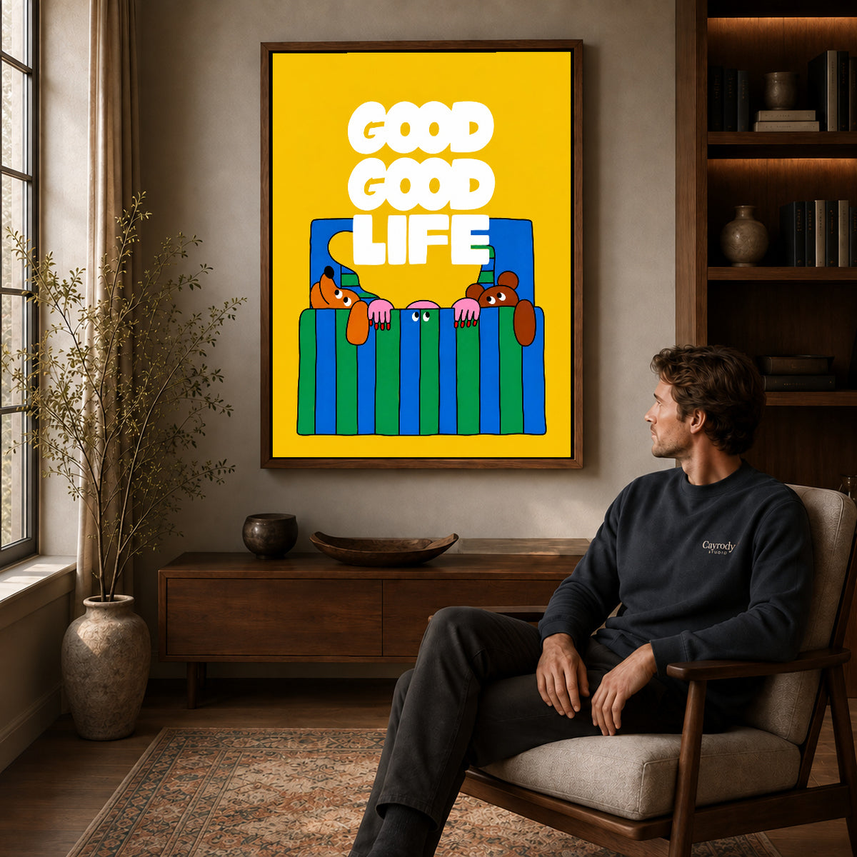 playful bedtime dogs canvas art in a walnut frame above a console beside a seated man.